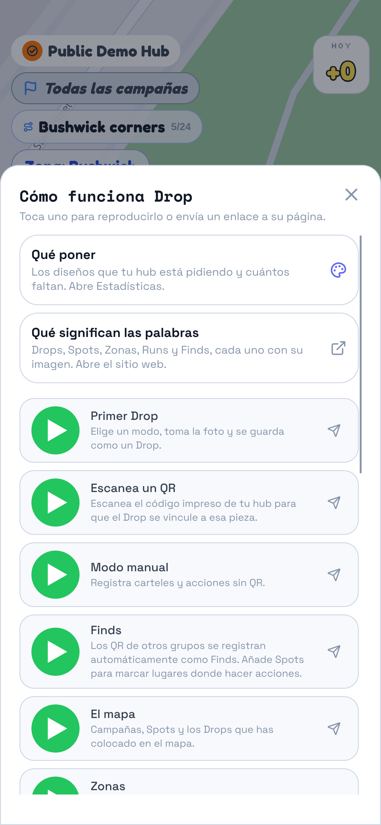El panel que abre ? sobre el mapa, con el título Cómo funciona Drop y una fila superior sobre el vocabulario. Se destacan las siete guías: Primer Drop, Leer QR, Modo manual, Finds, El mapa, Zonas y Eliminar un Drop o Spot. Cada una tiene botones para reproducirla y compartirla.