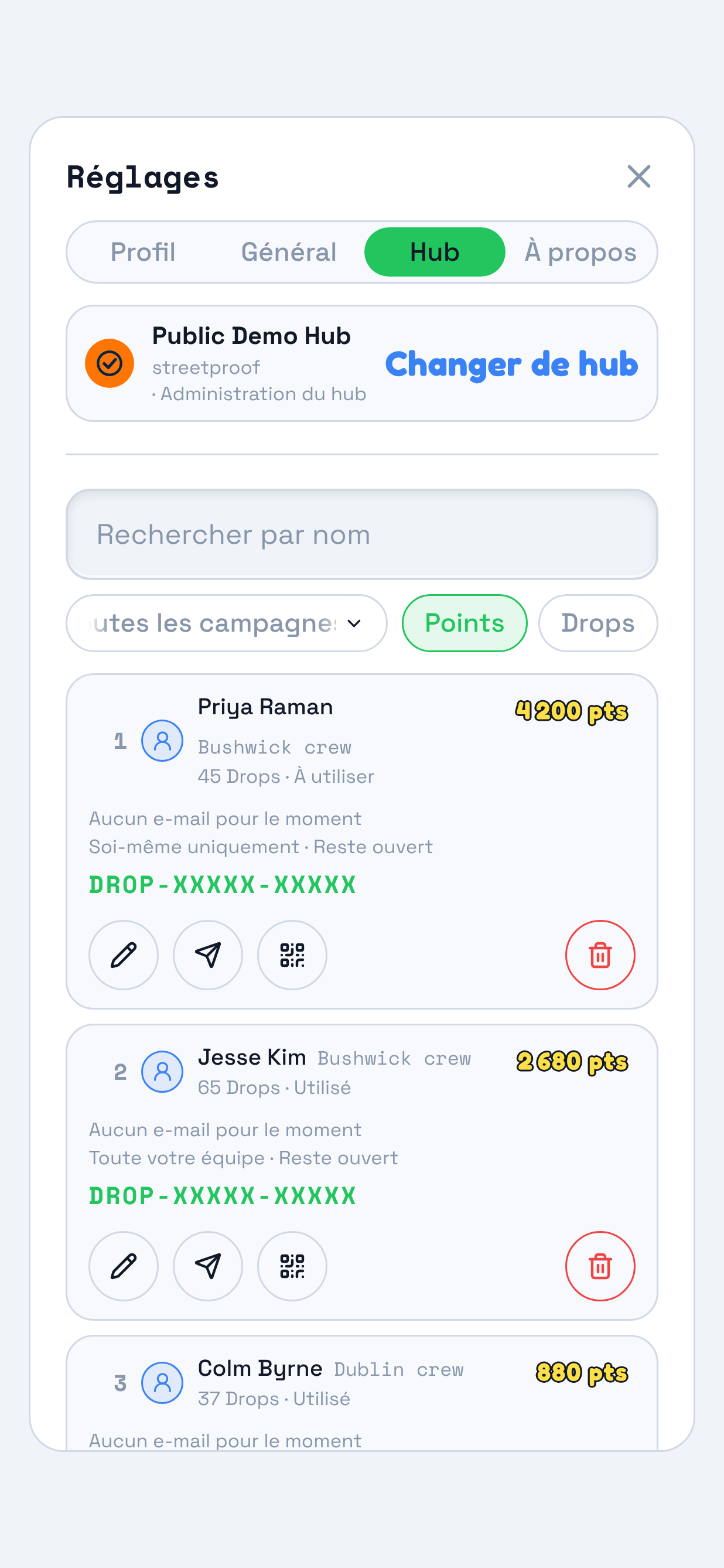 Le panneau Réglages de TraceReach Drop ouvert sur Hub. Le repère entoure cet onglet, troisième des quatre, et votre équipe dessous, avec le nom, l’étiquette et le code Drop de chaque membre.