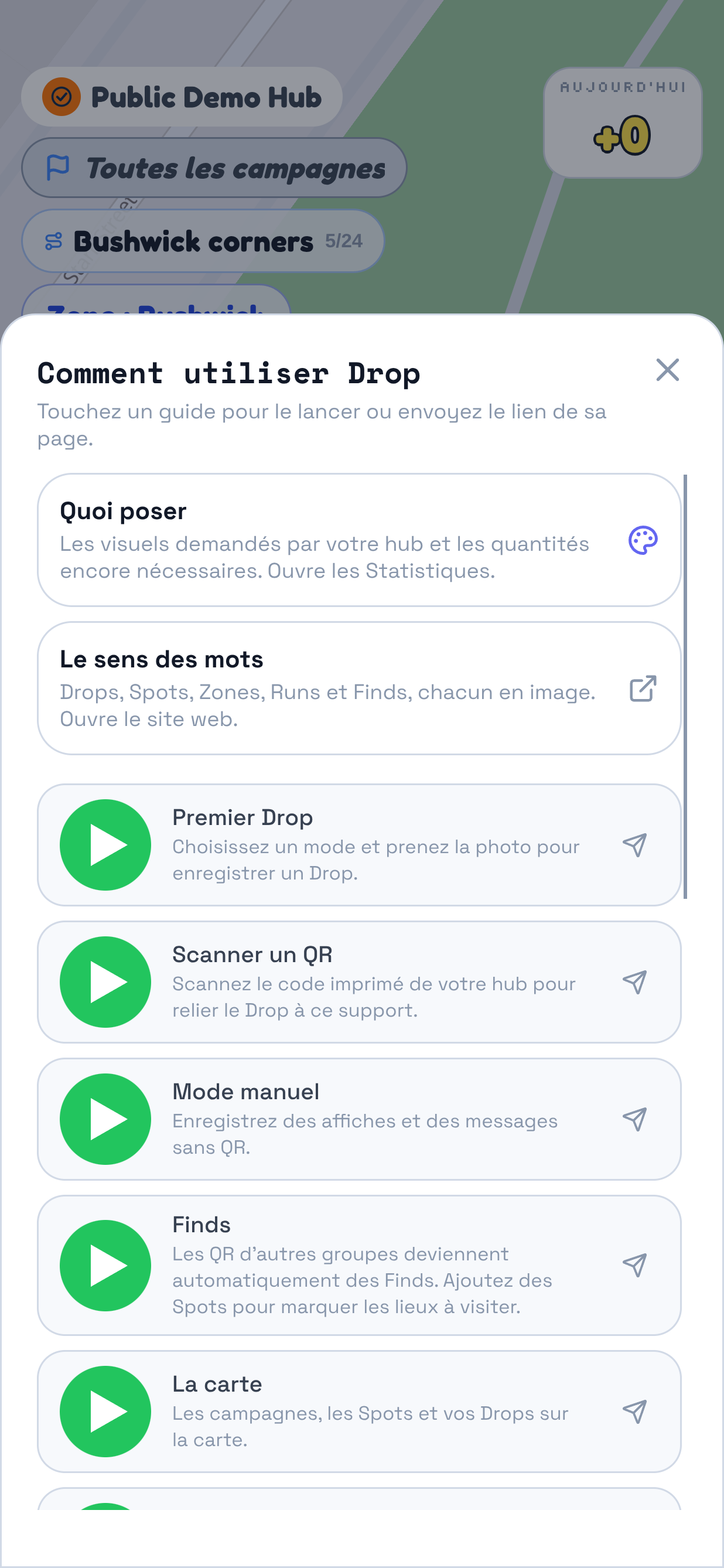 Le panneau ouvert par ? au-dessus de la carte, titré Comment fonctionne Drop, avec Le sens des mots en haut. Le repère entoure les sept guides : Premier Drop, Scanner un QR, Mode manuel, Finds, La carte, Zones et Retirer un Drop ou un Spot, chacun avec une commande de lecture et d’envoi.